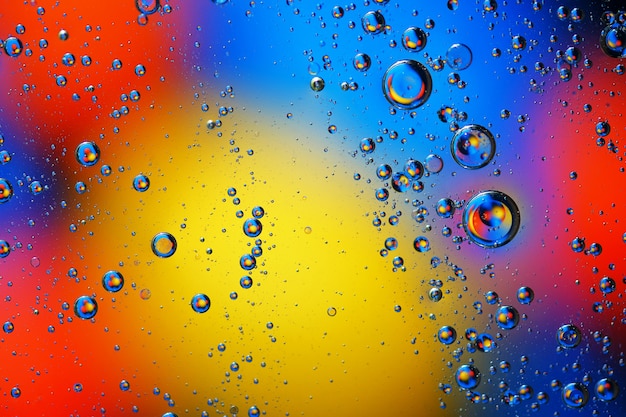 Abstract background of colorful bubbles on the surface of water and oil for your design