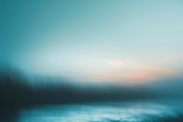 Abstract background defocused image of the sunset over the lake