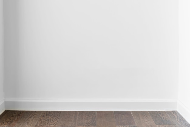 Premium Photo | Abstract background from blank white concrete wall at home  or office with wooden floor.