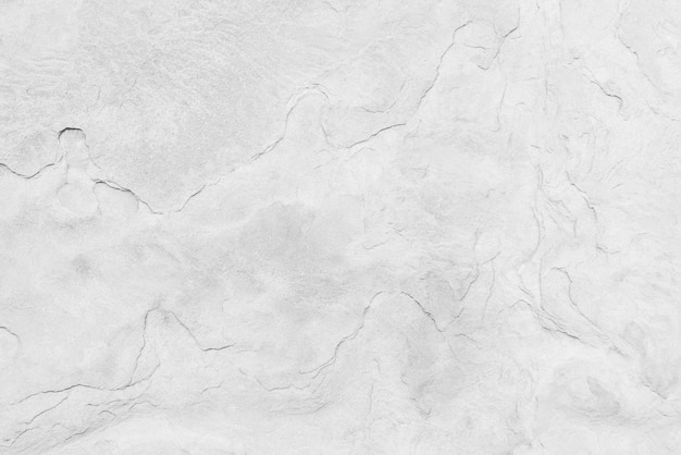 Abstract background from natural white marble texture in daylight.