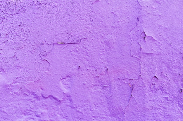 Фото Абстрактная предпосылка от фиолетовой конкретной стены текстуры. винтаж и ретро фон.