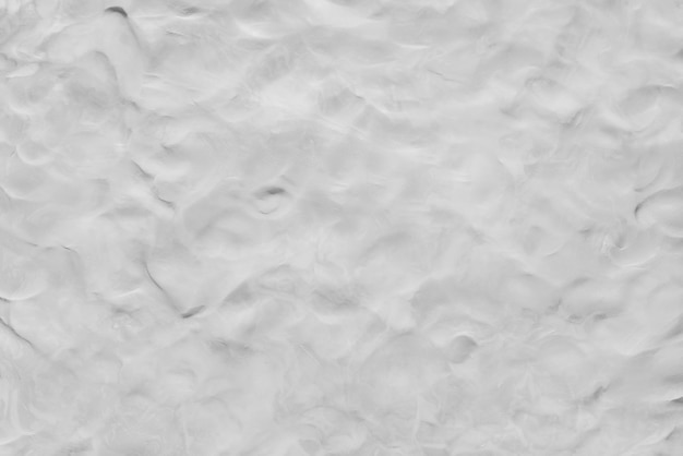 Abstract background from white clay texture on wall. Monochrome art wallpaper.