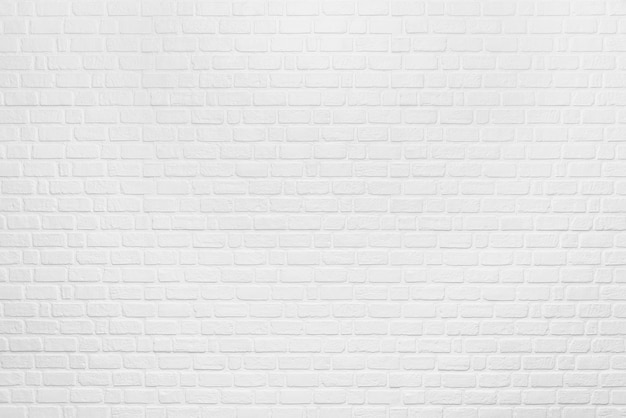 Фото Абстрактный фон из белого чистого кирпича на стене
