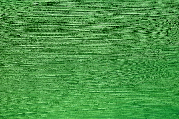 Abstract background of green color from acrylic paints. Concrete background.