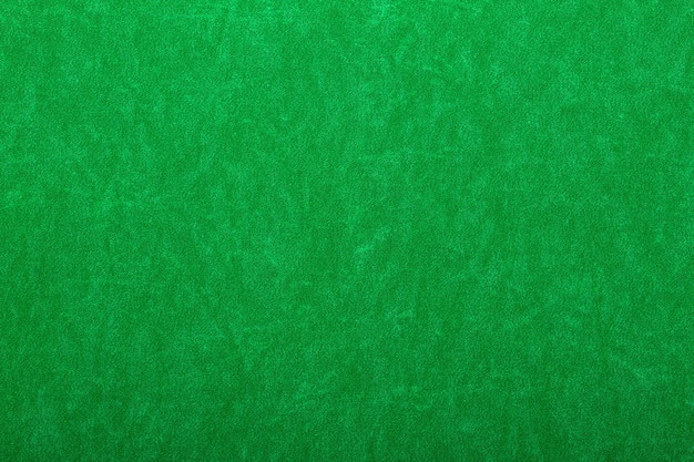 Abstract background of green felt on casino table