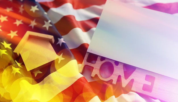 Photo abstract background house symbol on the american flag real estate insurance housing security