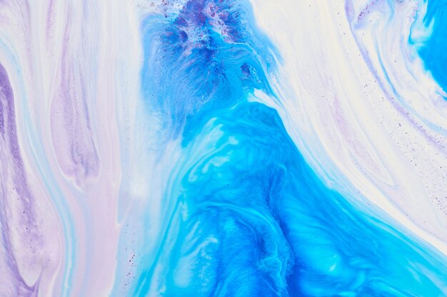 Abstract background liquid art multicolored marble texture paint stains and blots blue alcohol ink