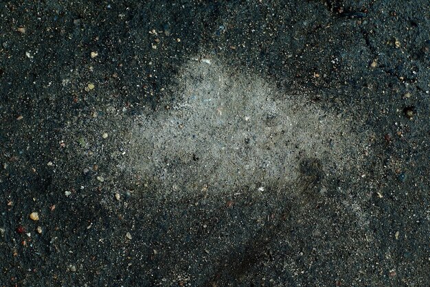 Photo abstract background made of small black stones