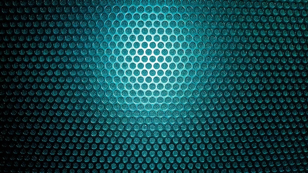 Abstract background metal mesh with even spaced holes in blue.