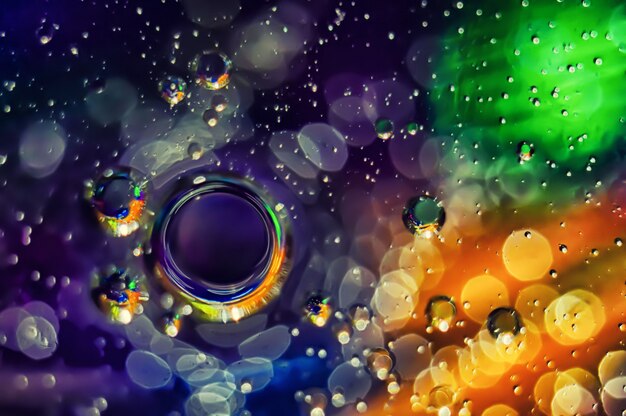 Abstract background. Multicolored circles on a blurred background. 