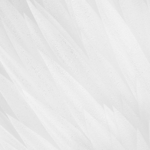 Фото Абстрактная предпосылка белых декоративных пер. мягкий фокус.