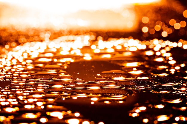 Abstract background of the oil droplets on the water.