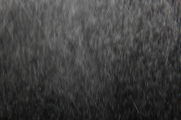 абстрактный фон наложение белый боке падающий снег туман вид на черном
