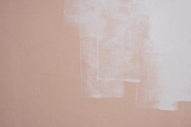 Abstract background pink wall is under painted with white paint