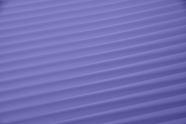 Abstract background of purple diagonal lines of light and shadow, toned in lavender, very peri, color of year 2022