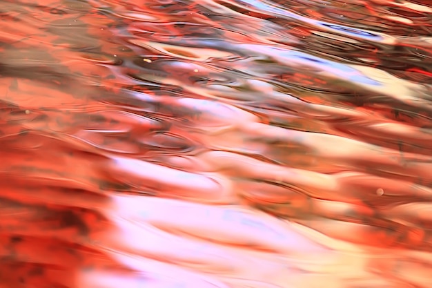 abstract background ripples on water / brown stream, water texture brown color on the swamp, peat