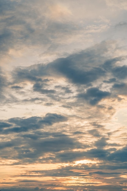 Abstract background sky Dawn Sunset Contrast dark shadow bright cloud sun orange silhouette above the mountains near the sea