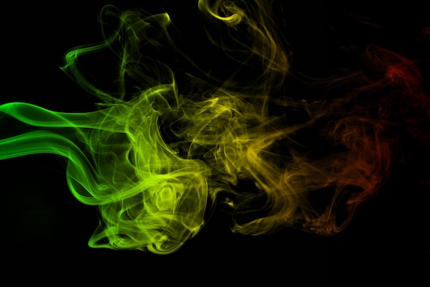 抽象的な背景の煙の曲線と波のレゲエの色