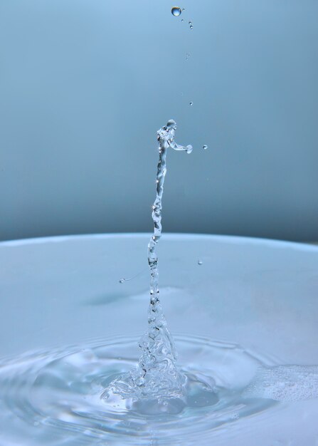 Abstract background of splash of color water, collision of colored drops, the concept art with abstract effect.