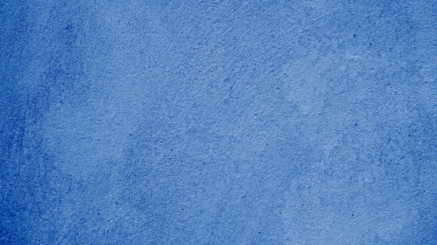 Muro di cemento blu astratto di struttura del fondo