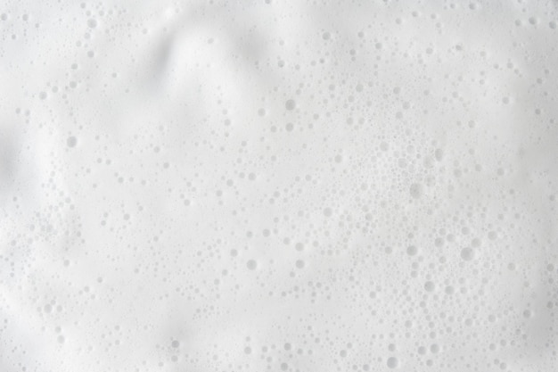 Photo abstract background white soapy foam texture shampoo foam with bubbles