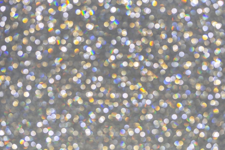 Фотография абстрактная предпосылка с красочными огнями bokeh круга.