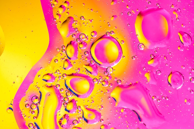 Abstract background with colorful gradient colors. Oil drops in water abstract psychedelic pattern image.