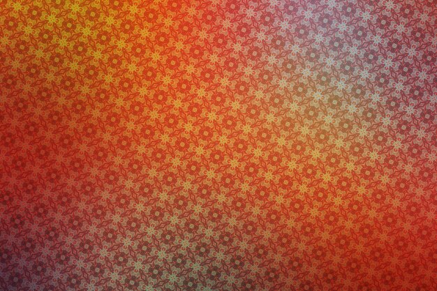 Abstract background with floral pattern in red orange and yellow colors