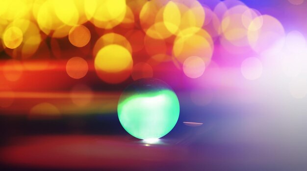 Abstract background with glowing ball and bokeh Divination and prediction of fate