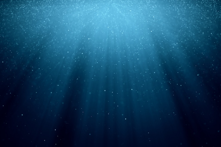 Photo abstract background with motion of shining blinking particles on blue background with rays of light. 3d illustration