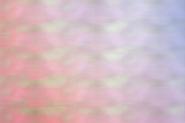 Abstract background with a pattern of colored dots on a white background