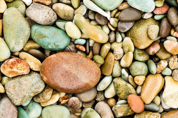 Abstract background with pebbles, sea stones texture.