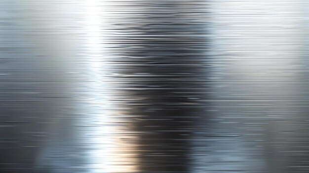 Abstract background with a shiny silver surface The background is made of many thin vertical lines that are reflecting light