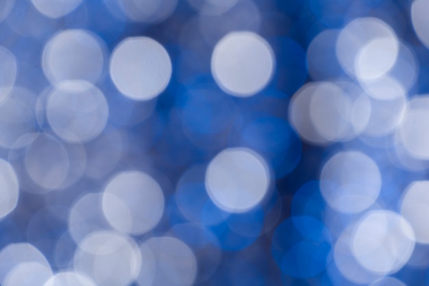 Abstract background with White and blue circles in bokeh