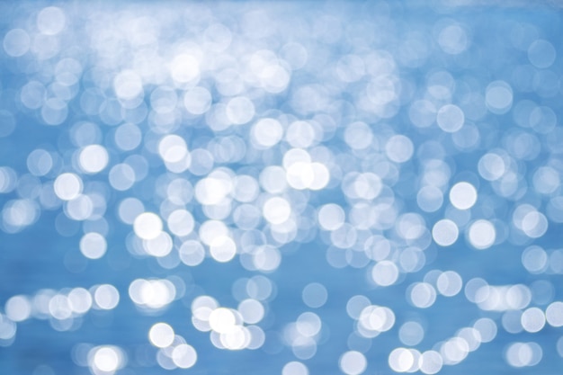 Abstract background with white and blue glitter. Christmas background