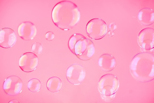 Abstract beautiful viva magenta soap bubbles background Pink soap bubbles wallpaper