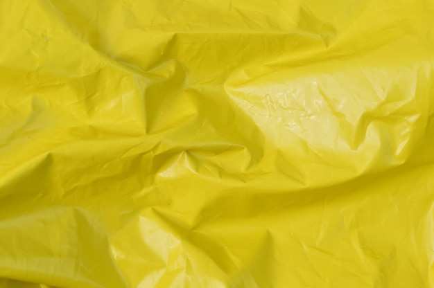 Abstract beeld van gele plastic zak textuur achtergrond Kopieer ruimte voor de tekst