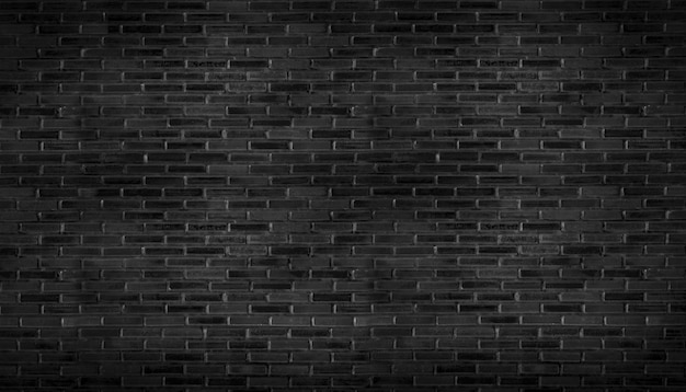 Photo abstract black brick wall pattern background and black backdrop, blank copy space.