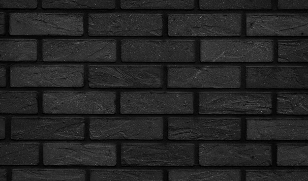 Foto muro di mattoni nero astratto
