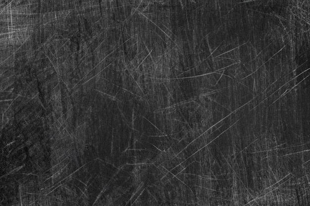 abstract black textured background with scratches