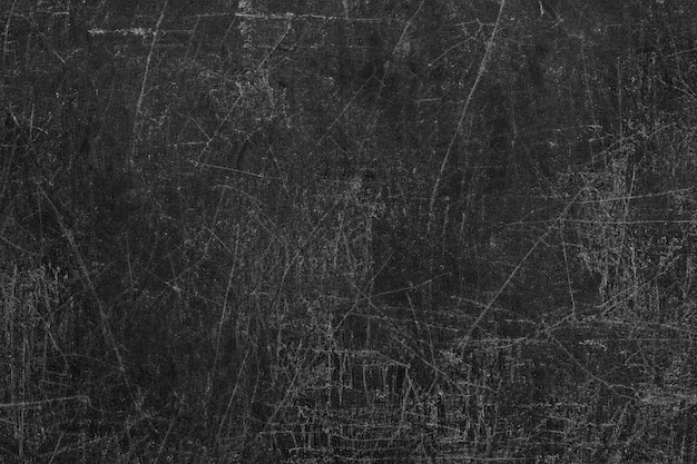 abstract black textured background with scratches