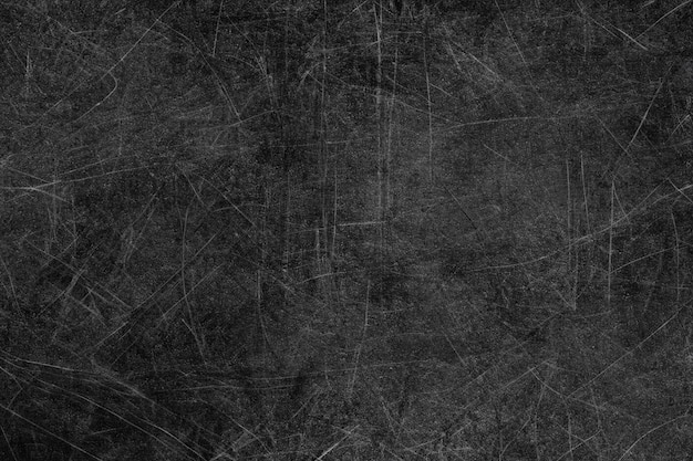 abstract black textured background with scratches