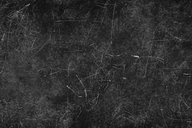 Photo abstract black textured background with scratches