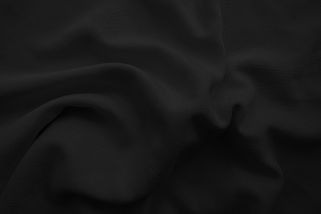 Abstract black wavy cloth Dark fabric background