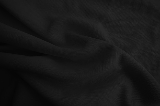 Abstract black wavy cloth Dark fabric background