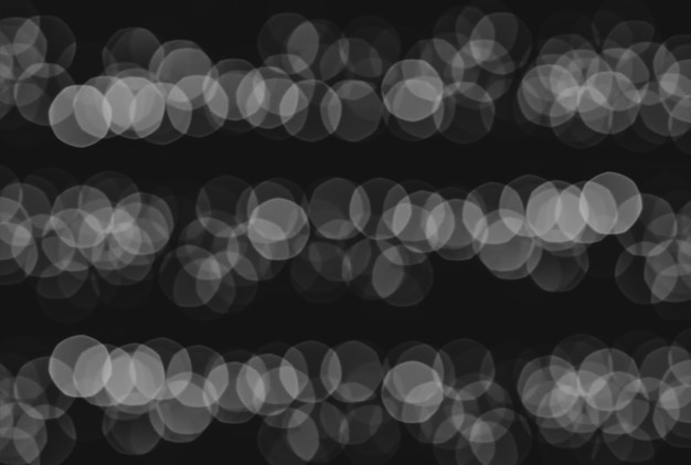 Abstract black and white overlay bokeh background