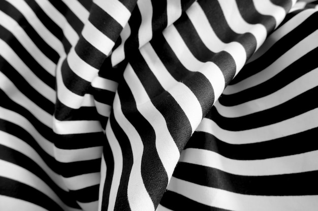 抽象的な黒と白の剥奪された布の背景