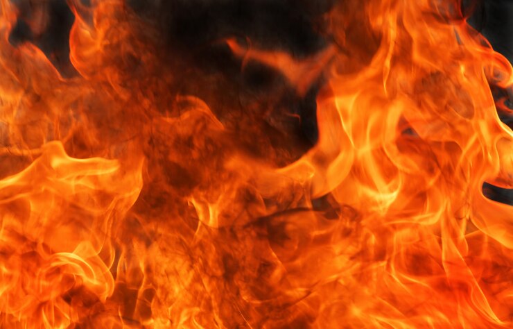 Photo abstract blaze fire flame background.