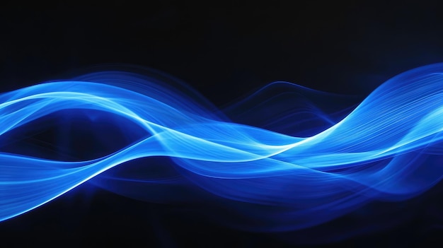 Photo abstract blue light waves on darkness