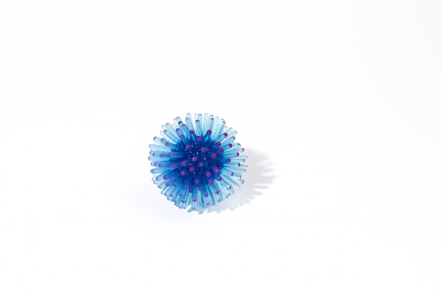 Abstract blue model of a strain of coronavirus infection.